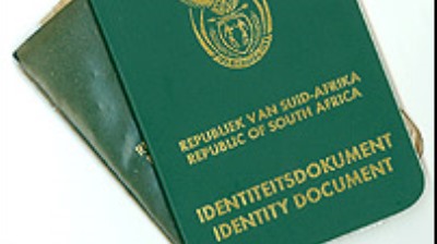 Home Affairs is adamant that the green ID books will remain legal until they're ready to roll out the new Smart ID cards at all their offices