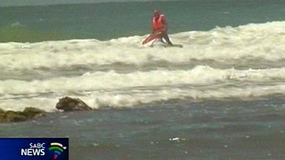 The National Sea Rescue Institute says the man was caught in a rip current along with two friends Monday night.