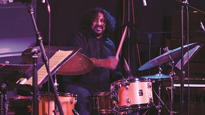 Kesivan Naidoo in full percusive mode, cymbal splashing and drum rolling.  Picture:SABC