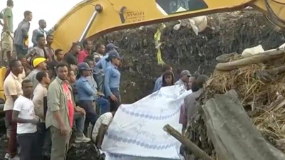 People gather at the site after a landslide at a garbage dump on the outskirts of Addis Ababa.  Picture:REUTERS