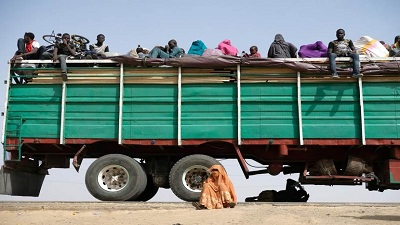 Refugees rest on, under and next to a truck in the Muna Garage area on the outskirts of Maiduguri.  Picture:REUTERS