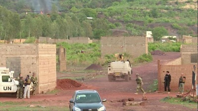 An armoured vehicle drives towards Le Campement Kangaba resort following an attack where gunmen stormed the resort in Dougourakoro, to the east of the capital Bamako. Picture:REUTERS