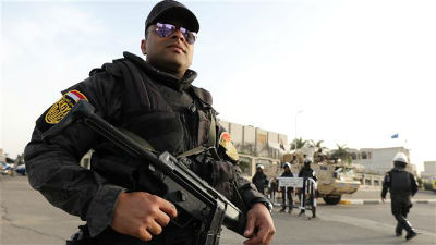 A security personnel stands guard in Cairo, Egypt. Picture:REUTERS