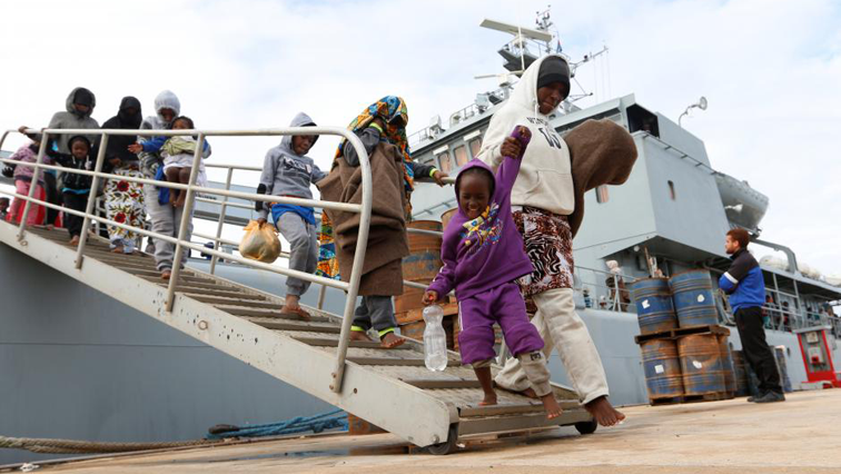 Migrants arrive at a naval base after they were rescued by Libyan coast guards in Tripoli, Libya.