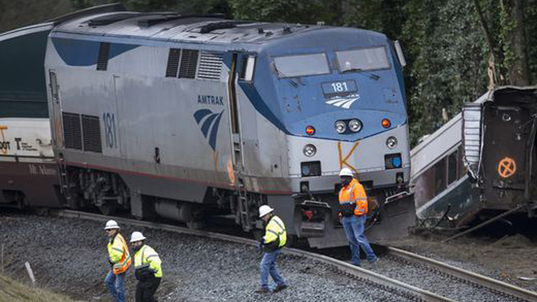 The train, which was carrying 77 passengers and seven crew, derailed in DuPont about halfway between Tacoma and the state capital Olympia on a curve that passes over busy Interstate 5 at about 7:40 am (1540 GMT).