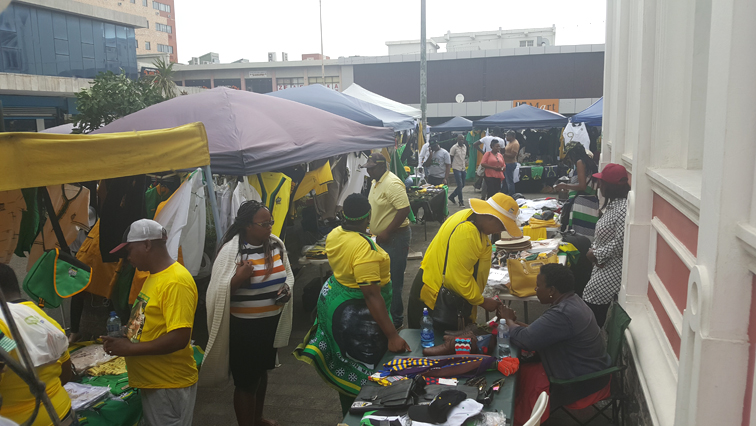 ANC members buy party regalia from vendors in East London.