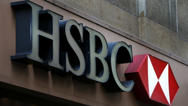 A sign is seen above the entrance to an HSBC bank branch in midtown Manhattan in New York City, December 11, 2012.