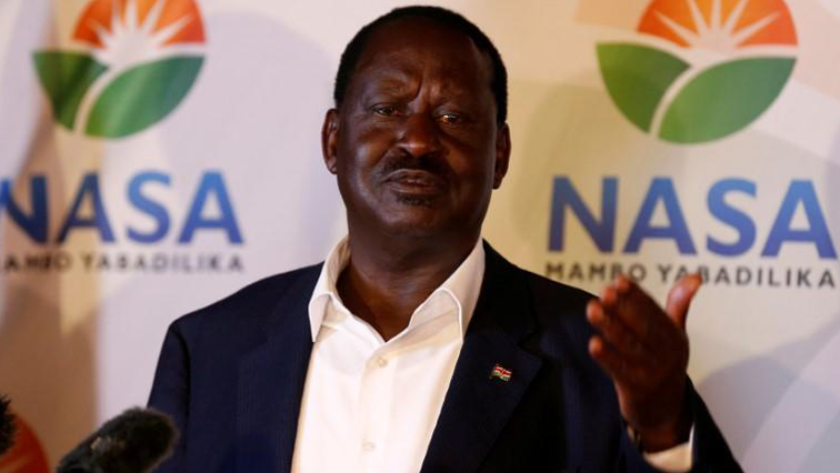 Raila Odinga had himself sworn in as an alternative president Tuesday in front of thousands of supporters.