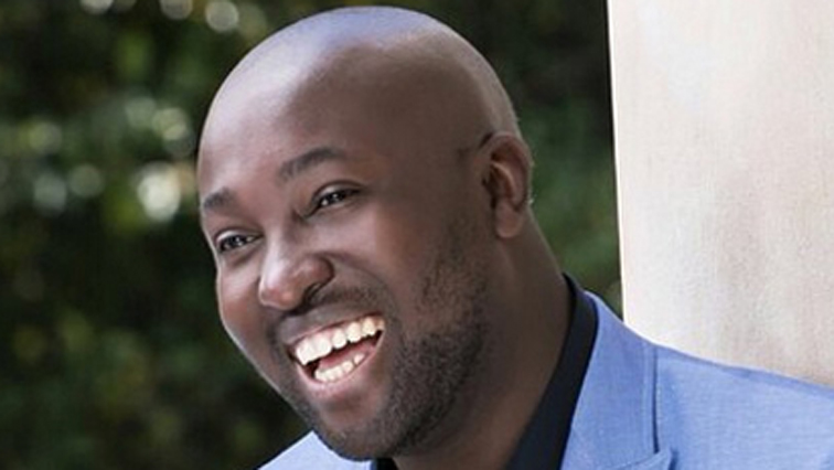 Simba Mhere smiling in picture.