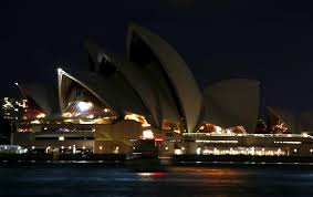 The Sydney Opera House can be seen after its lights were switched off for Earth Hour in Sydney, Australia.