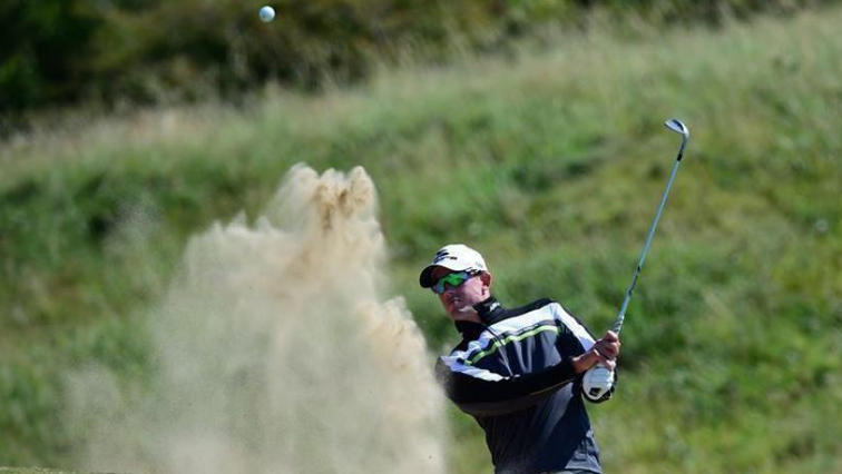 Sweden's Alexander Bjork plays out of a bunker during a practice round.