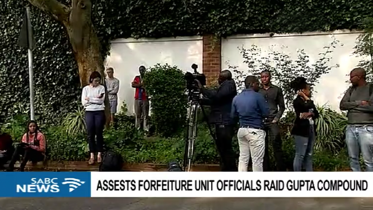 Journalists outside the Gupta's compound in Saxonwold.