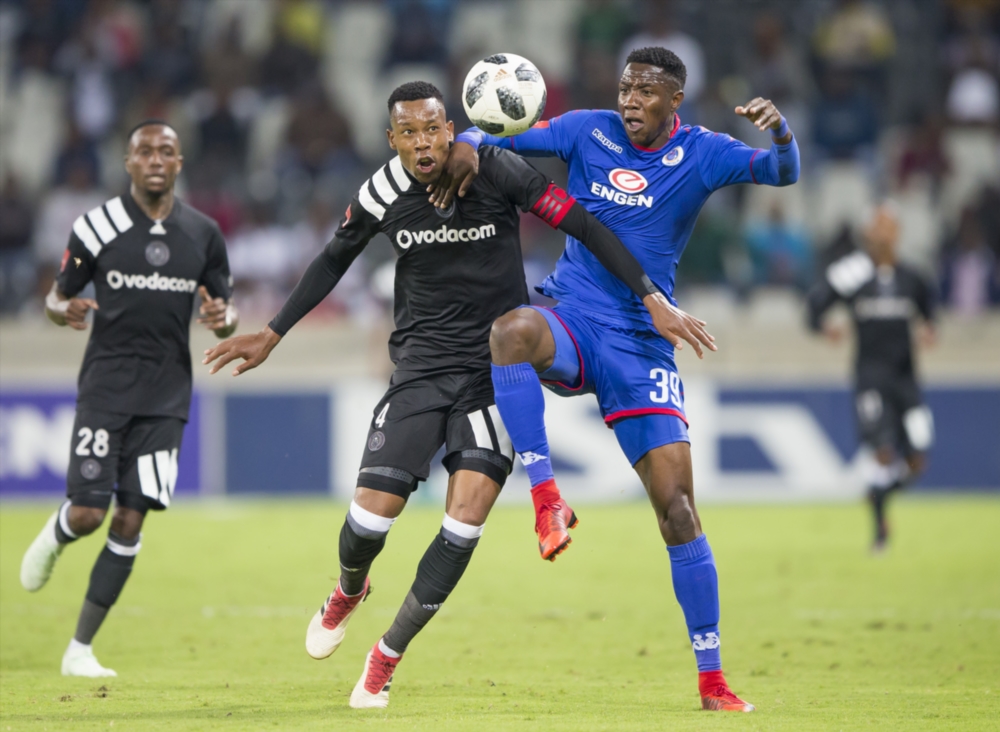 Happy Jele of Pirates and Evans Rusike of Supersport United during the Absa Premiership match between SuperSport United and Orlando Pirates at Mbombela Stadium.