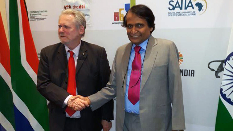 SA Minister of Trade and Industry Rob Davies (L) and India's Minister of Commerce and Industry Suresh Prabhu (R).