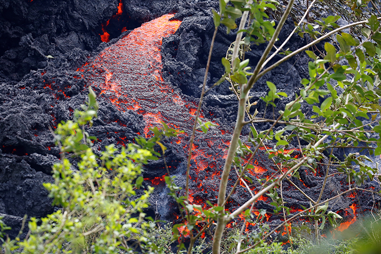 Lava erupts from a fissure east of the Leilani Estates subdivision during ongoing eruptions of the Kilauea Volcano in Hawaii.
