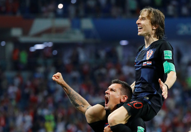Croatia's Luka Modric and Dejan Lovren celebrate after the match