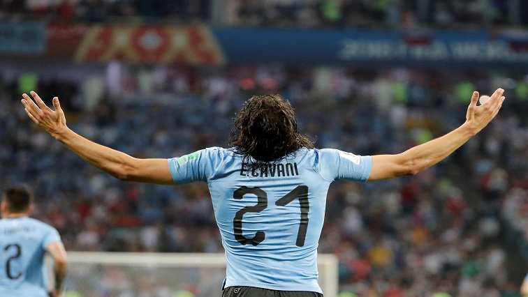 Uruguay's Edinson Cavani celebrates scoring their first goal.