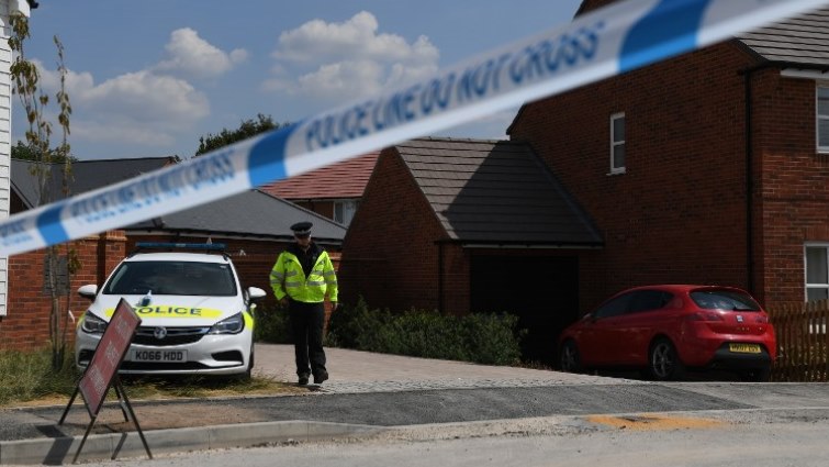 A police officer guards a cordon at a residential address in Amesbury, southern England, on July 5, 2018 where police reported a man and woman were found unconscious in circumstances that sparked a major incident...