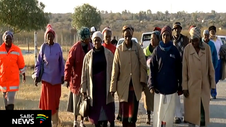Elderly Sassa grant beneficiaries braved the cold weather to receive their monthly payments.