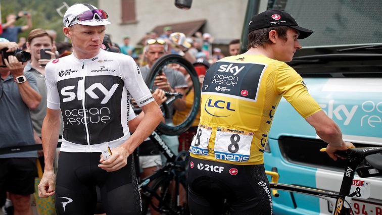 Team Sky riders Geraint Thomas of Britain, wearing the overall leader's yellow jersey, and Chris Froome of Britain before the start.