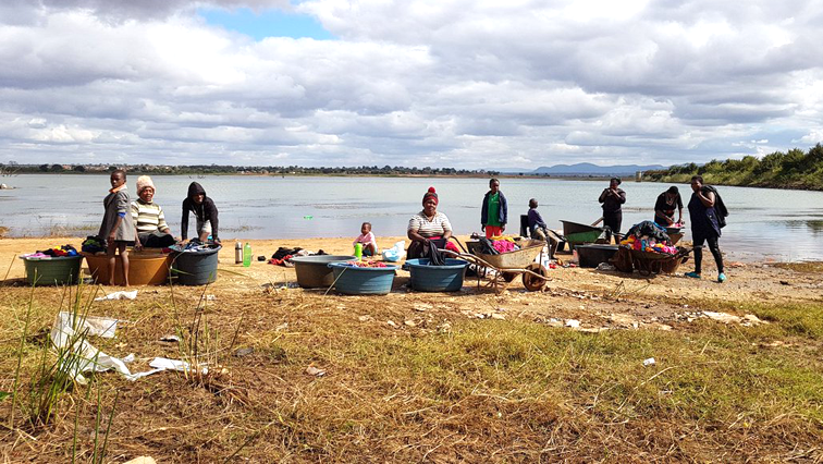 24 years into democracy, the Makuleke community in Limpopo still share water with animals. Women wash clothes at this crocodiles infested dam.