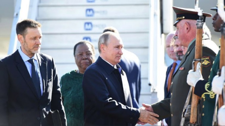 Russia President Vladimir Putin arrives at OR Tambo International Airport, received by Minister Naledi Pandor, for the 10th BRICS Summit.