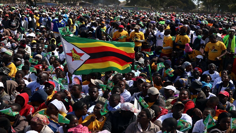 Supporters of President Emmerson Mnangagwa gather at an election rally in Marondera, Zimbabwe, July 21, 2018.