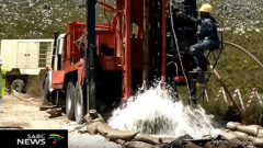Drilling into the ground for water