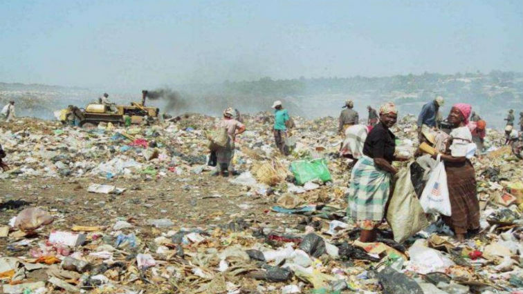 People at a landfill site