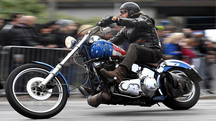 A biker riding his Harley
