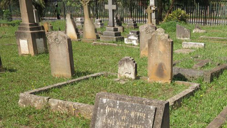 A farmer allegedly dug up sixty graves belonging to former labourers .