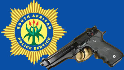 SAPS badge and a gun