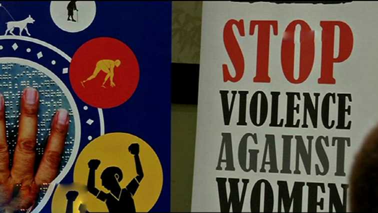 Poster calling for an end to violence against women