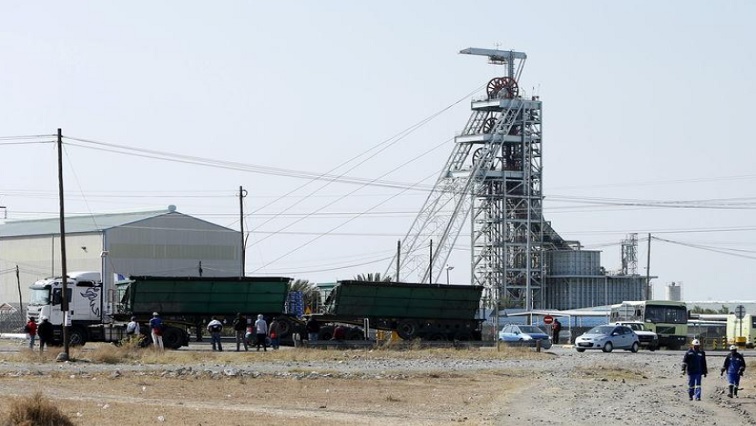 Workers leave Lonmin's Karee mine at the end of their shift, outside Rustenburg, northwest of Johannesburg July 29, 2015.