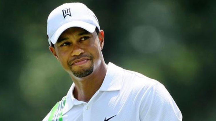 Tiger Woods admitted he had nearly been overcome with emotion as he walked up the 18th fairway.