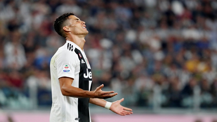 Juventus' Cristiano Ronaldo reacts.