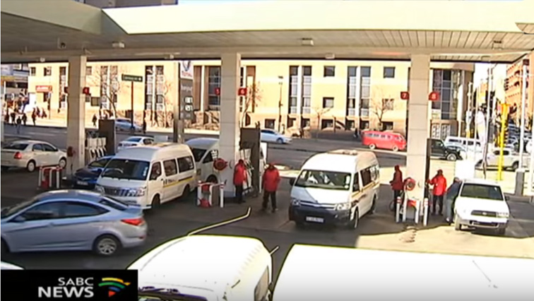 Motorists are queuing at petrol stations  to fill up their tanks ahead of the fuel hike.