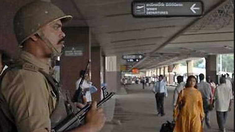 Airport guards an people walking around