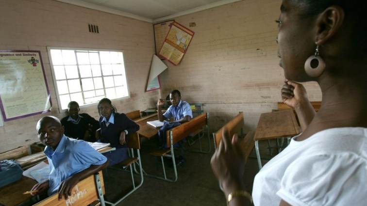 A Teacher  educating students at Ibhongo High School, in  Soweto.
