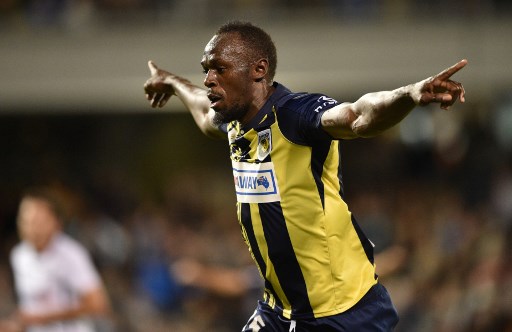 Olympic sprinter Usain Bolt celebrates scoring a goal for A-League football club Central Coast Mariners in his first competitive start for the club against Macarthur South West United in Sydney on October 12, 2018.