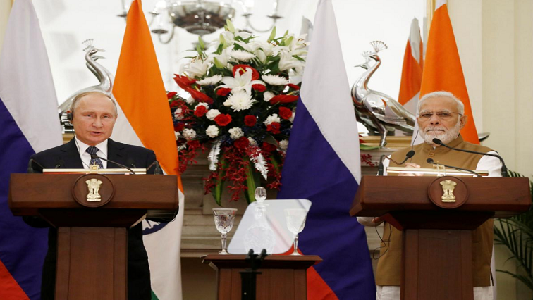 Russian President Vladimir Putin and India's Prime Minister Narendra Modi