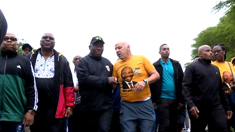 Ramaphosa on a morning walk with others