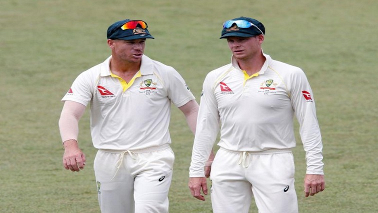 Australia's David Warner and Steve Smith leave the pitch after beating South Africa.