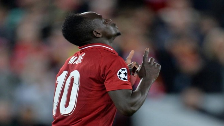 Liverpool's Sadio Mane celebrates scoring their fourth goal.