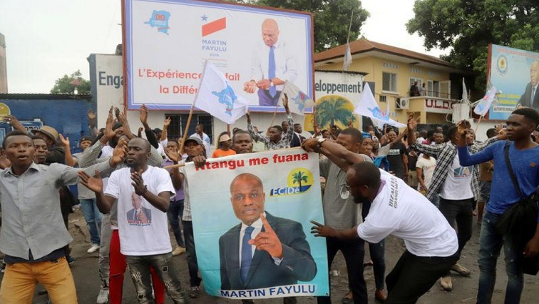 Supporters of Congolese presidential candidate Martin Fayulu celebrate after the opposition coalition chosen him to be the candidate in a December presidential election, in Kinshasa, Democratic Republic of Congo, November 12, 2018.