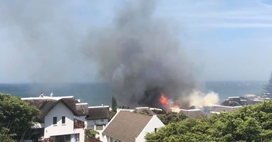 Smoke from burning houses
