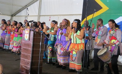 Women singing on stage