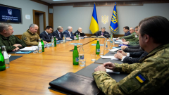 President Petro Poroshenko having a meeting with members of the army.