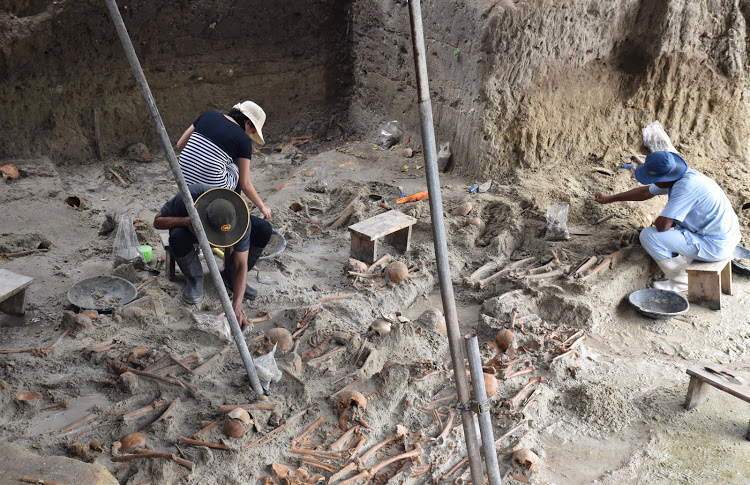 A Judicial Medical Officer and the staff dig up skeletons at the site of a former war zone in Mannar, Sri Lanka November 27, 2018. Picture taken November 27, 2018. REUTERS