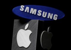 3D-printed Samsung and Apple logos are seen in this picture illustration.